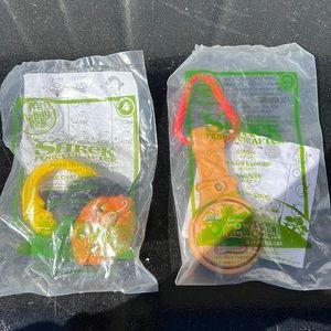 Lot of 2 Shrek Forever After Happy Meal Toys Puss in Boots Watch and Gingy Watch